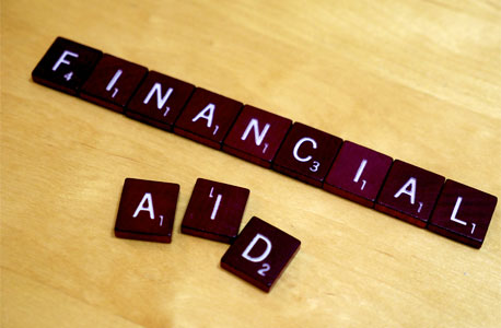 "FINANCIAL AID" on Scrabble tiles