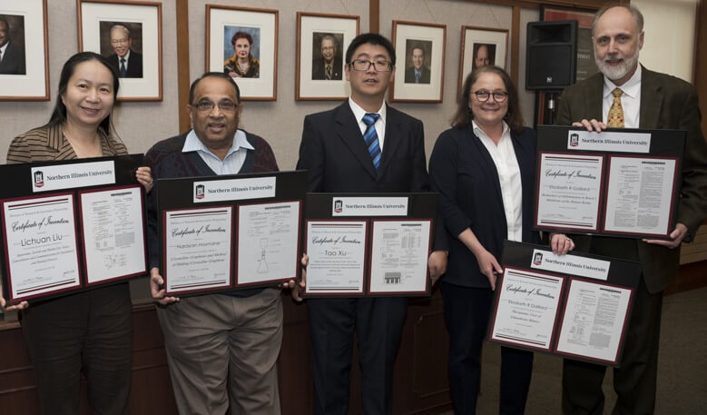 Professors (left to right) Lichuan Liu, Narayan Hosmane, Tao Xu and Elizabeth Gaillard, pictured here with President Doug Baker, were among those recognized for their work resulting in patents.