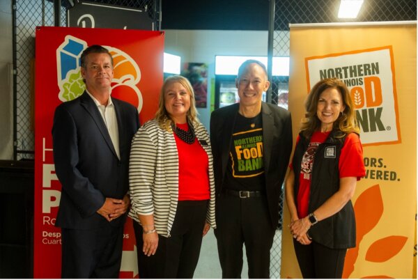 (L-R) NIU Foundation President and CEO Michael Daigler; NIU Assistant Vice President for Student Development, Dean of Students Kelly Olson; Joe Intrakamhang, ’02; Northern Illinois Food Bank President and CEO Julie Yurko, ’90. (Photo: NIU Foundation)